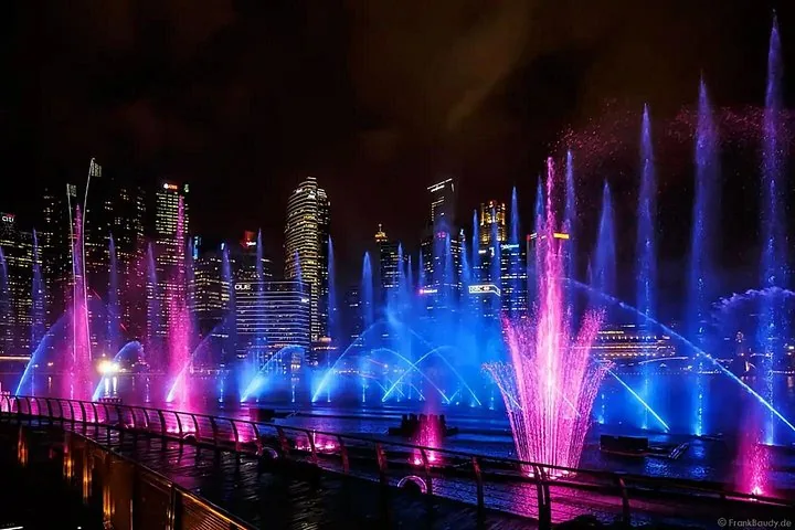 Colorful illuminated water fountains at Marina Bay night show